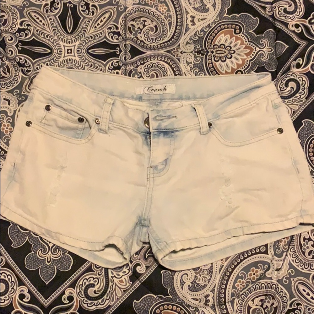 Light washed denim shorts.